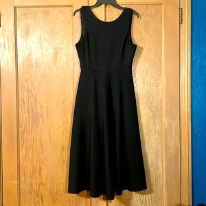 NWT Little black dress with Ruffle back. Size Medium Large